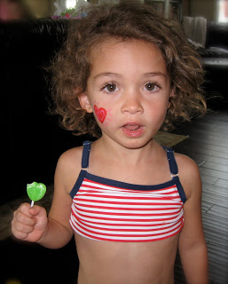 Treats and face painting made this beach party extra fun. 