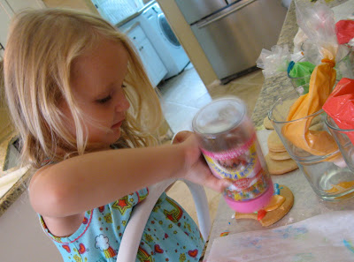 Kids love helping to decorate sugar cookies. 