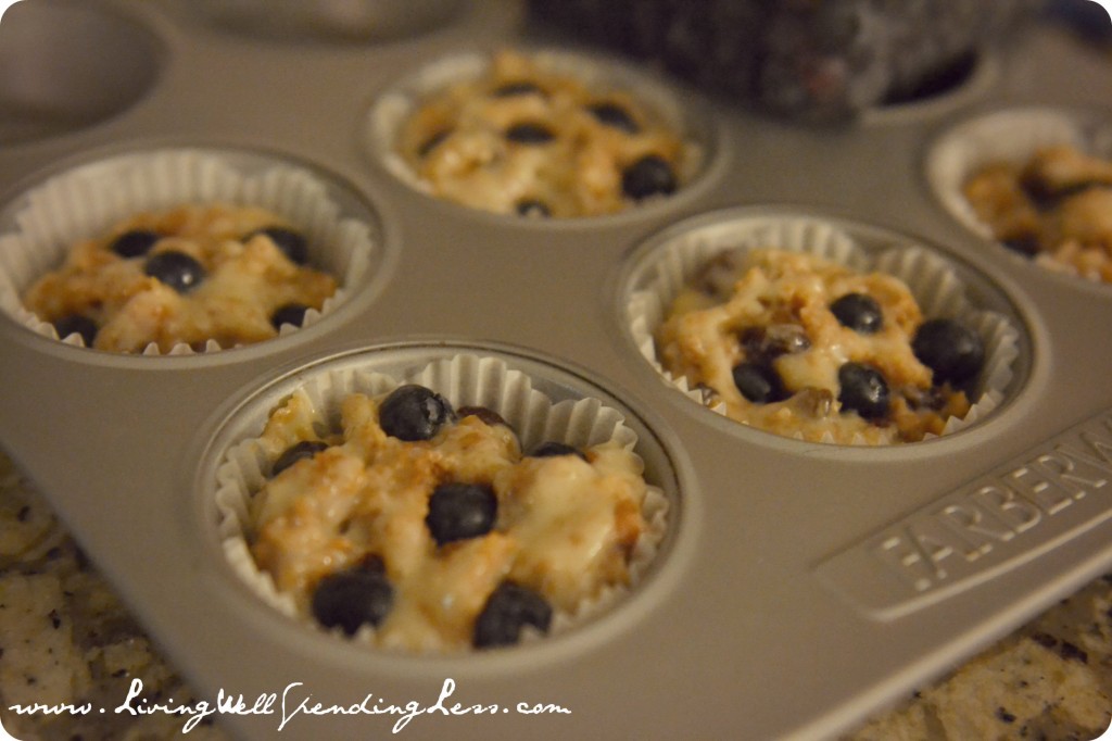 Fill lined muffin cups with the batter and add a small handful of blueberries to each muffin. 