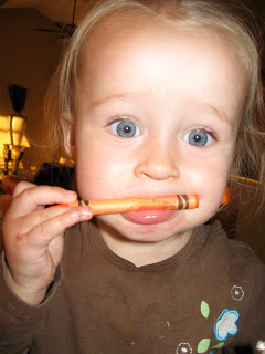 All kids love crayons even from a young age like this baby.