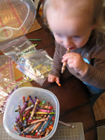 Young kids enjoy coloring with crayons and using different colors.