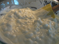 Slowly melt white chocolate chips and stir.