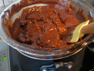 Slowly melt chocolate chips over low heat on the stove.