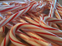 Unwrapped pile of candy canes. 