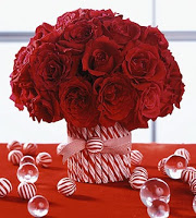 This DIY candy cane vase will make the perfect centerpiece at your holiday dinner table.