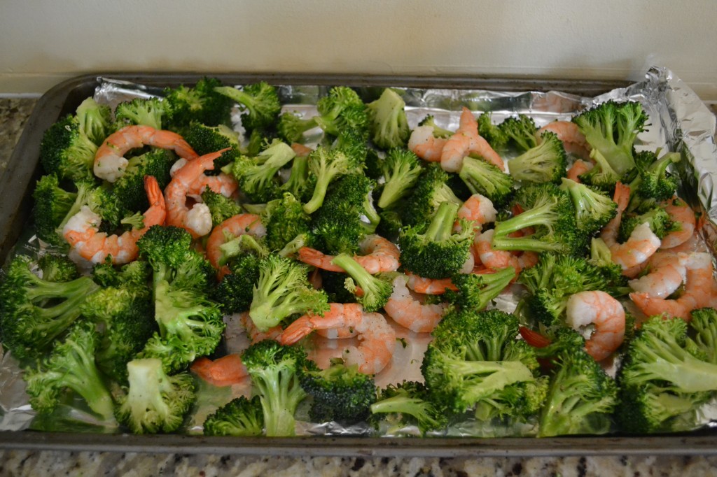 Spread the shrimp and broccoli on a tin foil-lined baking sheet.