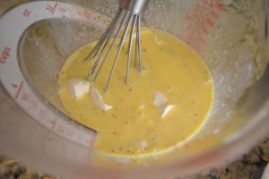 Add the salt and pepper, half and half and cream cheese to the egg mixture and keep whisking!