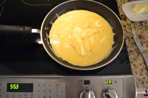 Spread out the cream cheese in the frying pan so it's not clumped together in your egg mixture. 