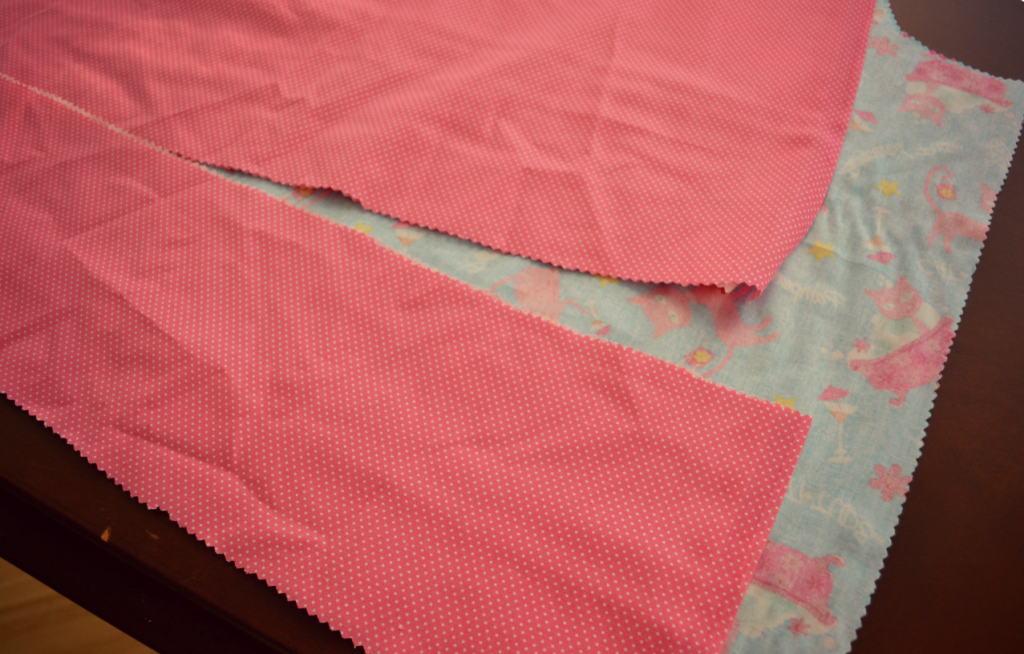 Choose a coordinating fabric for the hemmed pieces of the pillowcase dress. 