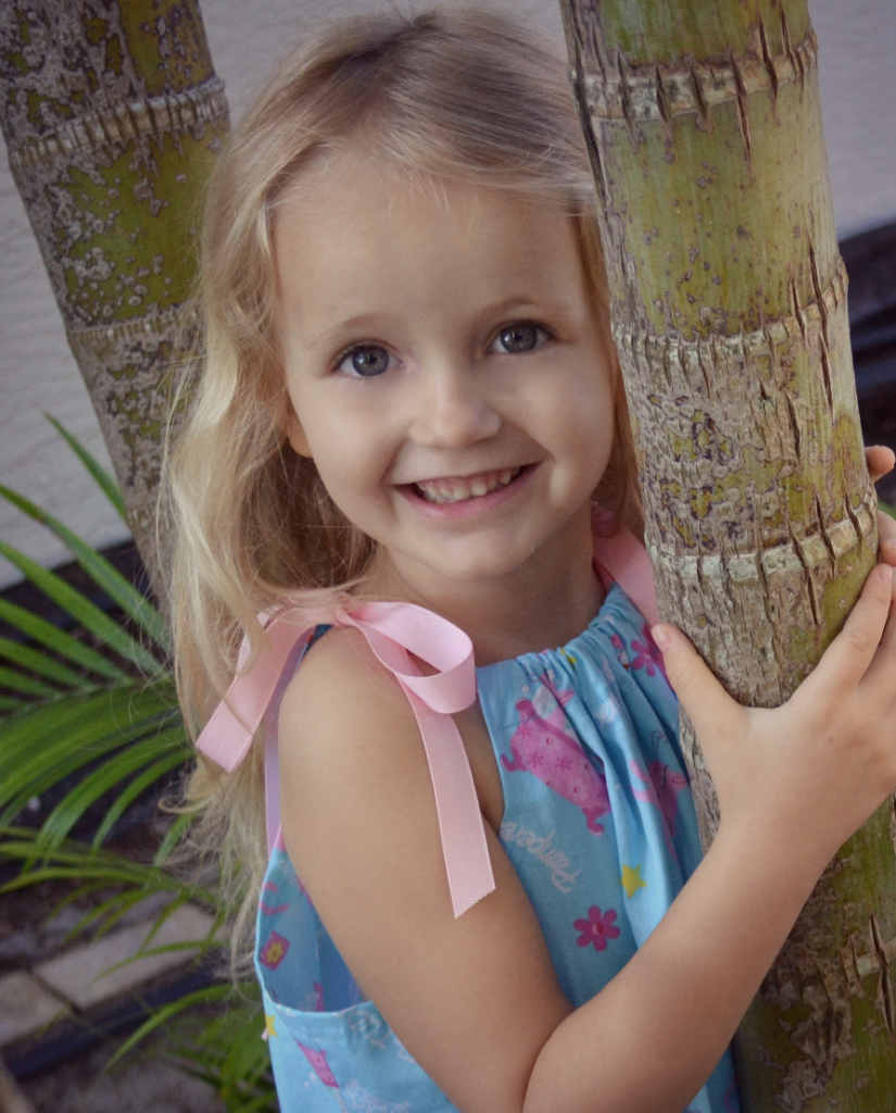 Maggie looks too cute in her new pillowcase dress and she absolutely loved it!