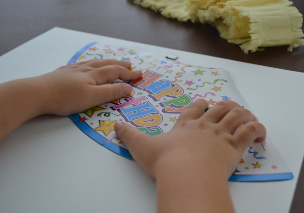 We used a party hat to create a template on the back of adorable scrapbook paper. 