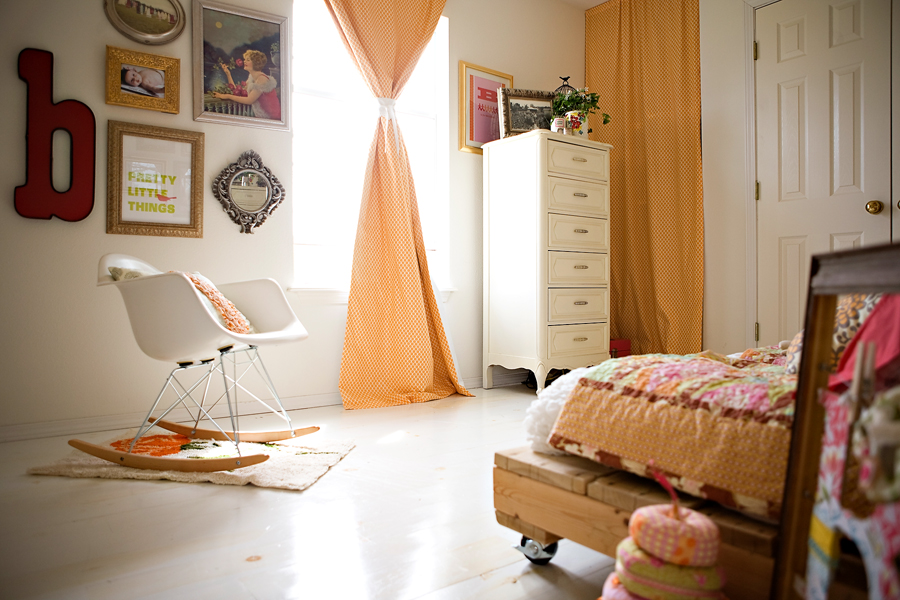 Sheets are great for decorating, like these bright yellow curtains in this cute white guest bedroom with yellow accents. 