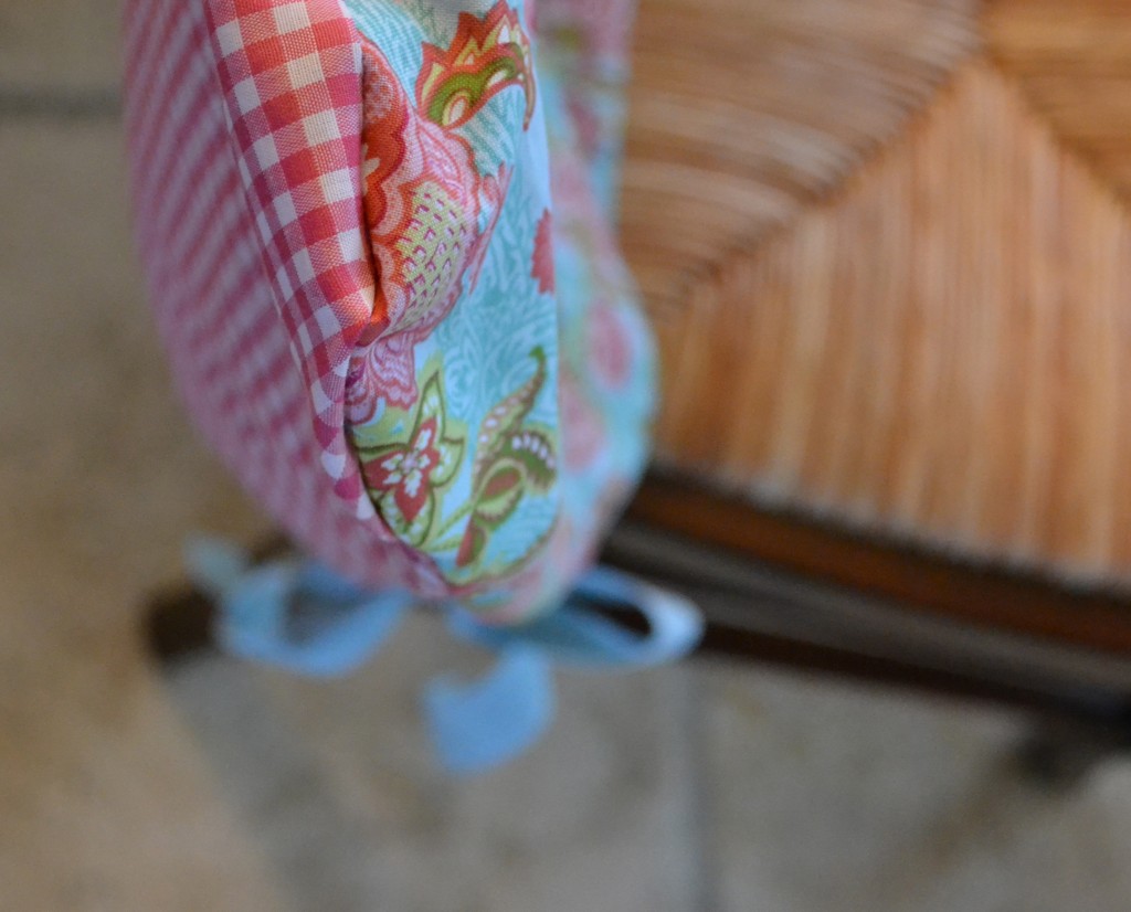 The contrasting patterns on this DIY Simple Chair Slipcover give it that special little something!