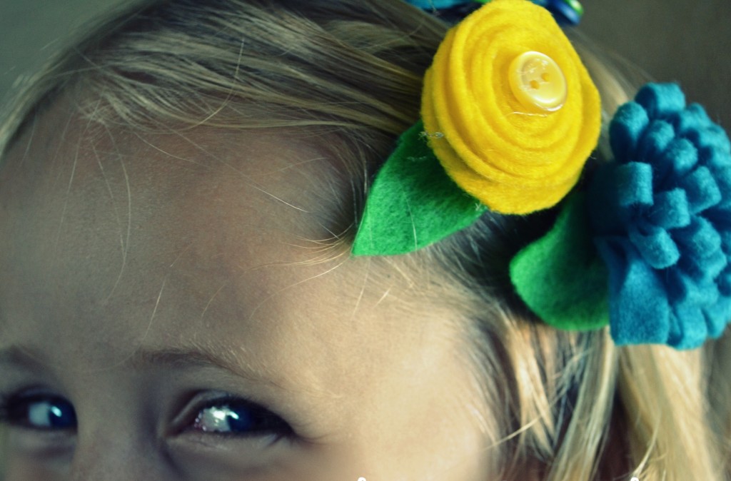 Finish off one of your flower clips with a single button to add detail. 