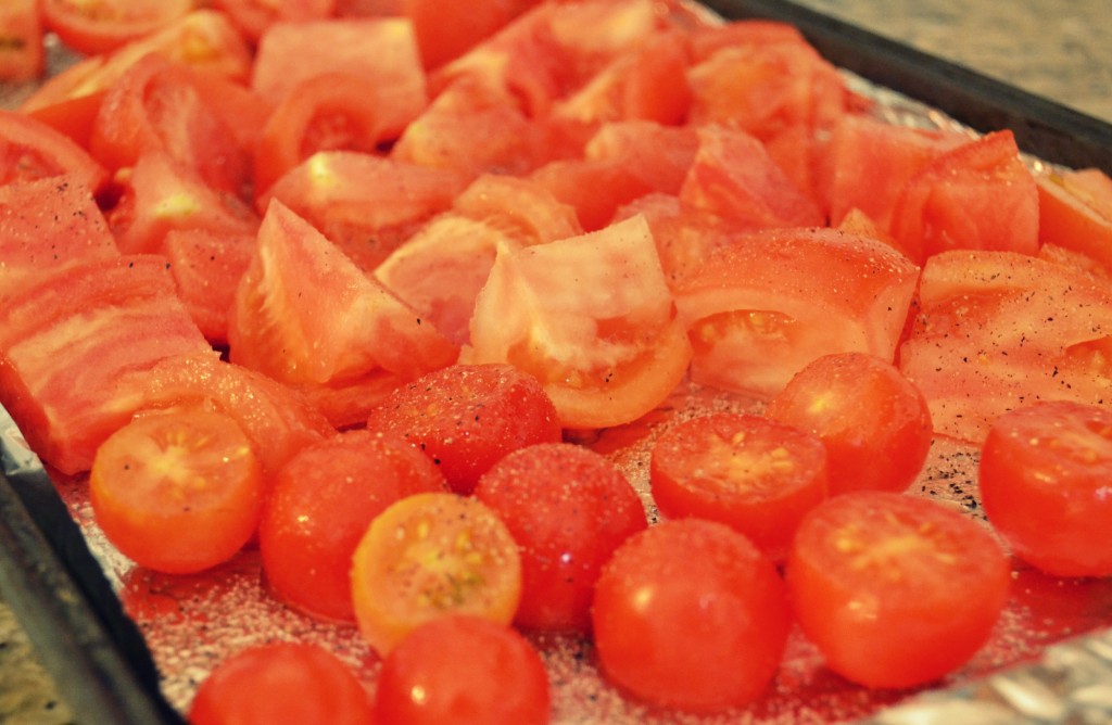 To cook the winter diet soup, begin by arranging baby tomatoes on a foil lined pan topped with olive oil, salt, and pepper. 