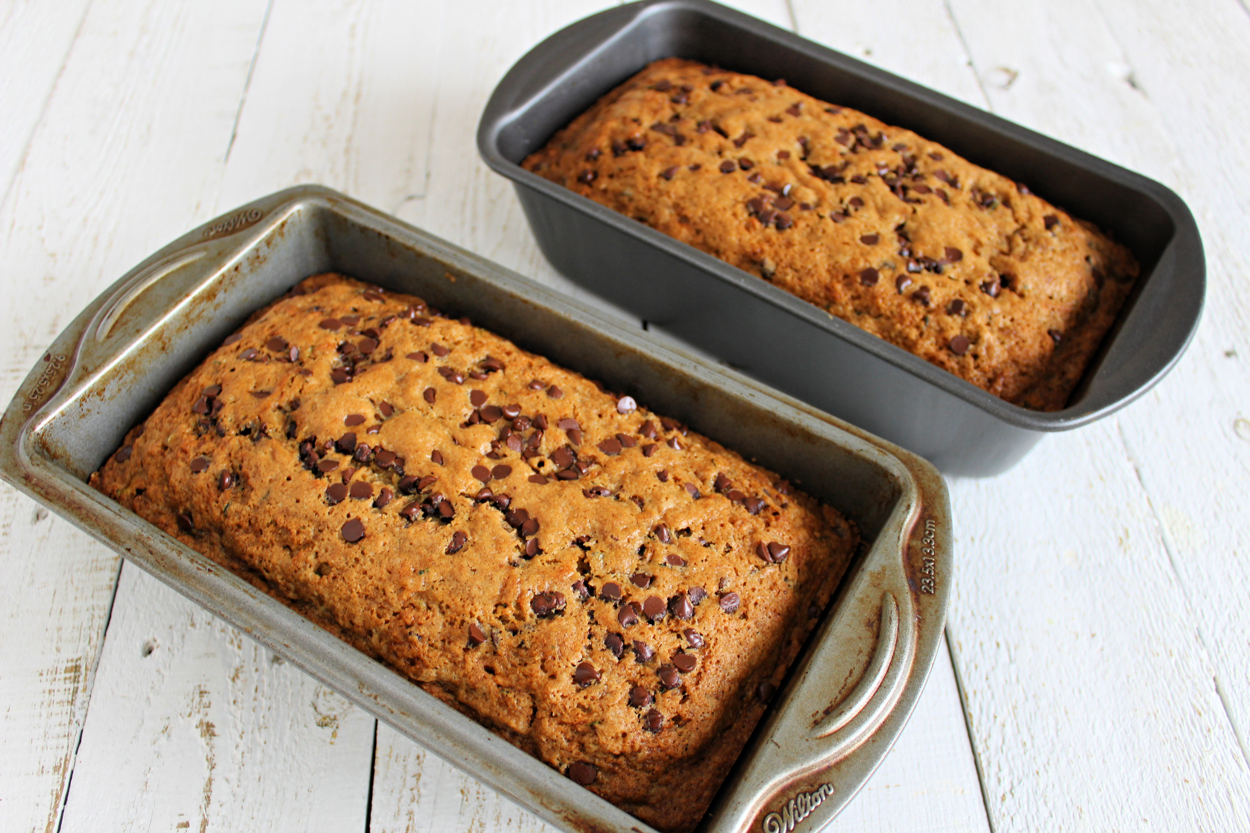 Got zucchinis? This super moist & ridiculously easy zucchini bread recipe whips up fast and makes enough to share! It also freezes beautifully!