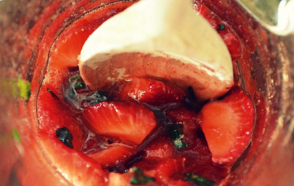You'll want to muddle, or smush the strawberries just slightly - enough to make enough juice to dissolve the sugar. 
