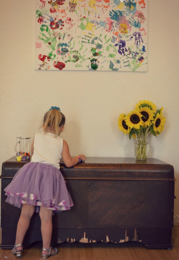 More rainbow artwork from the kids is the perfect decoration in this room