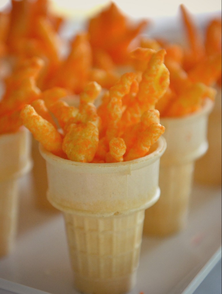 Serving edible Olympic "torches" made from Cheetos and ice cream cones is a fun touch.