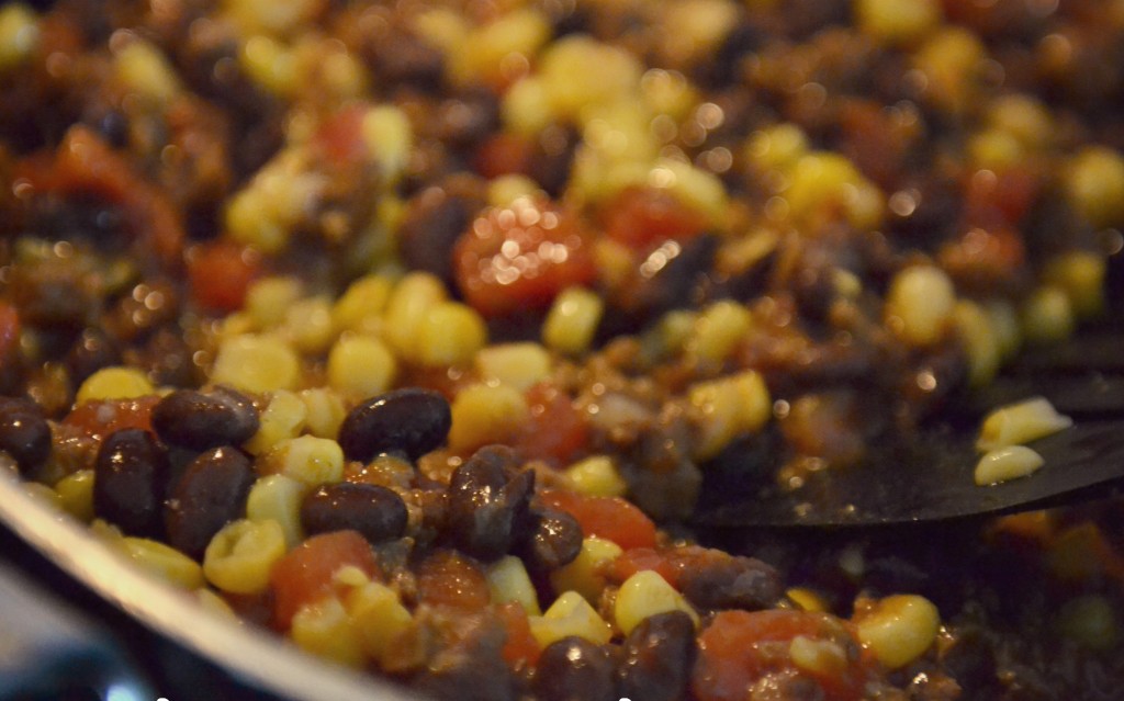 Combine butter brown vegetarian crumbles, water, taco seasoning, tomatoes, black beans and corn in large saucepan