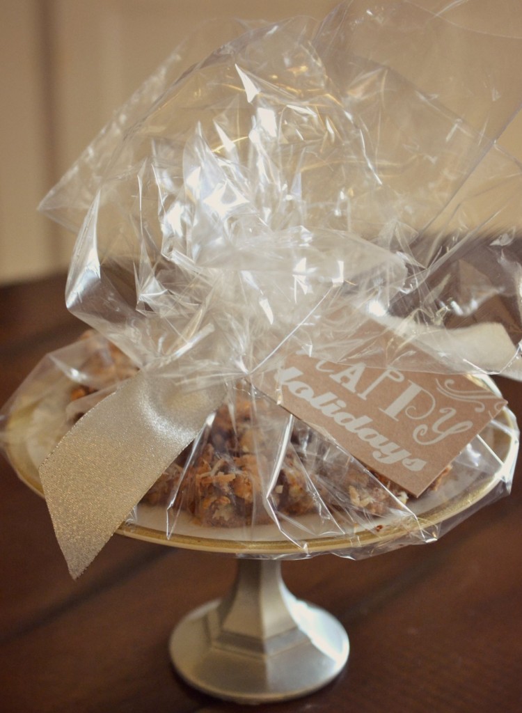 Add deserts to finished cake stand and finish with a bow and gift tag. 