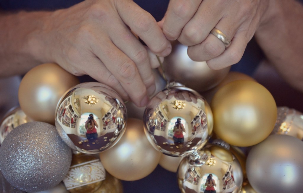 Once the hanger is full of ornaments carefully twist it back together again. 