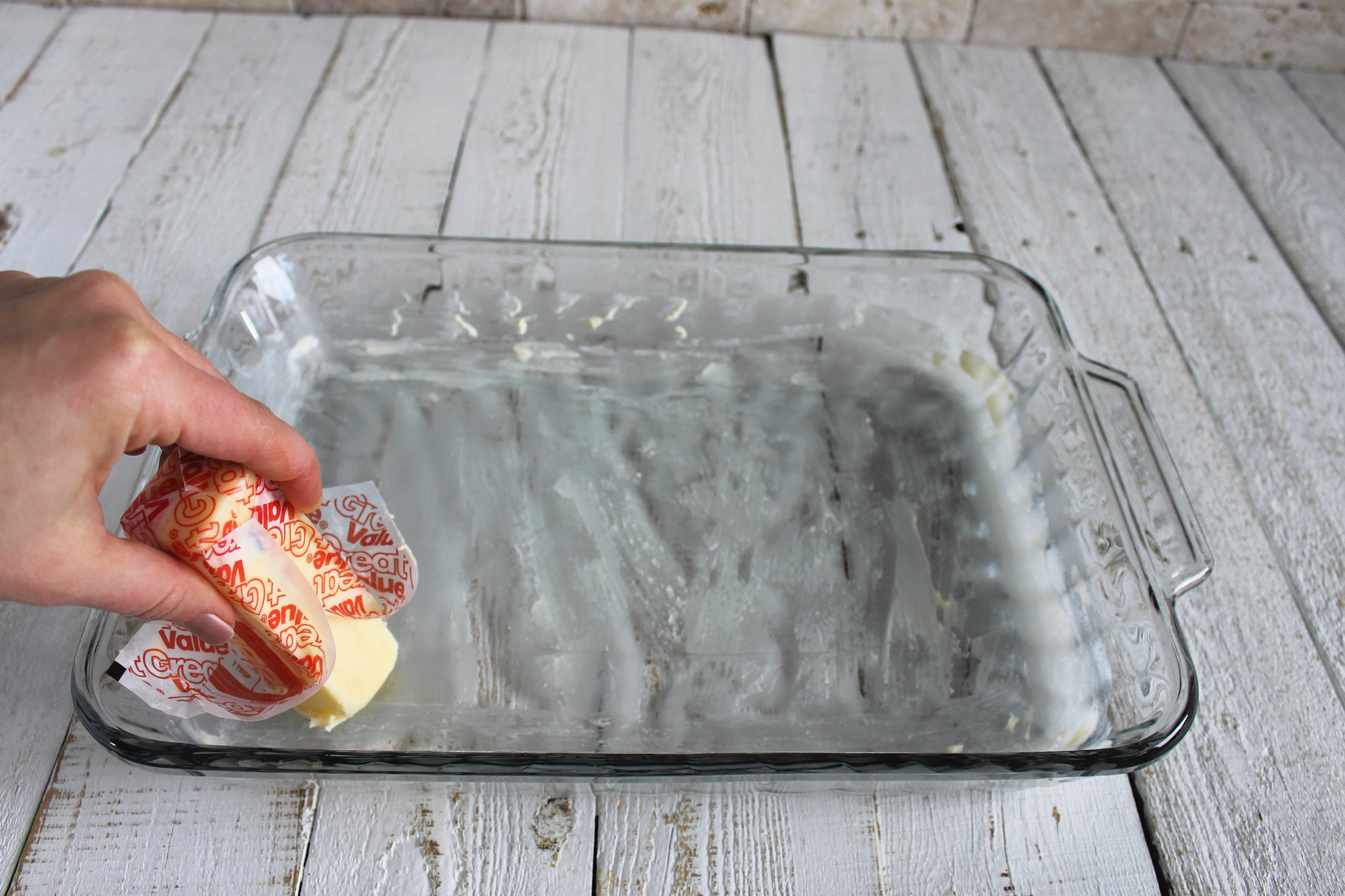 Every great recipe starts off with greasing a baking dish with butter! 