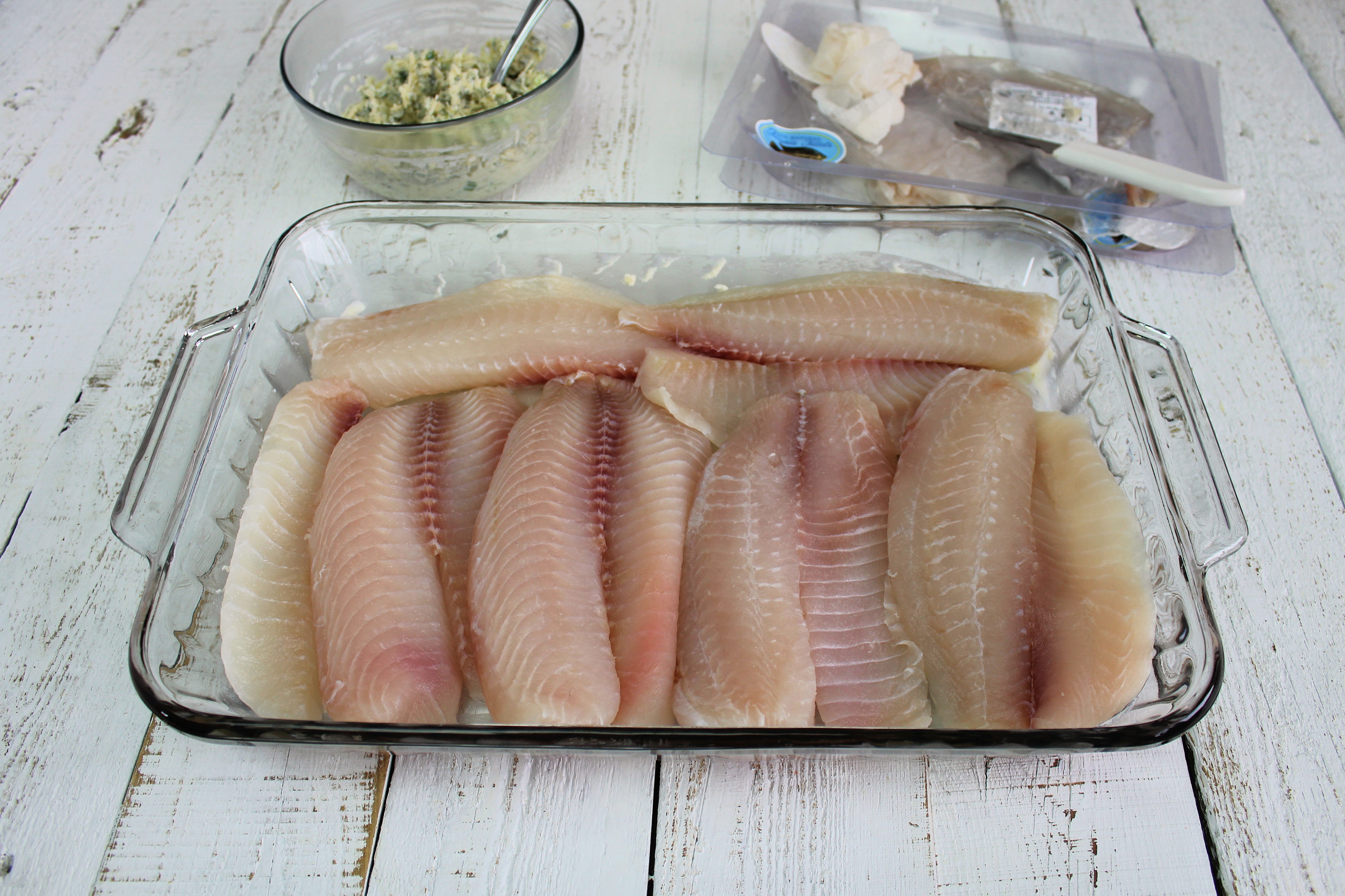 Arrange fish in a single layer in baking dish.