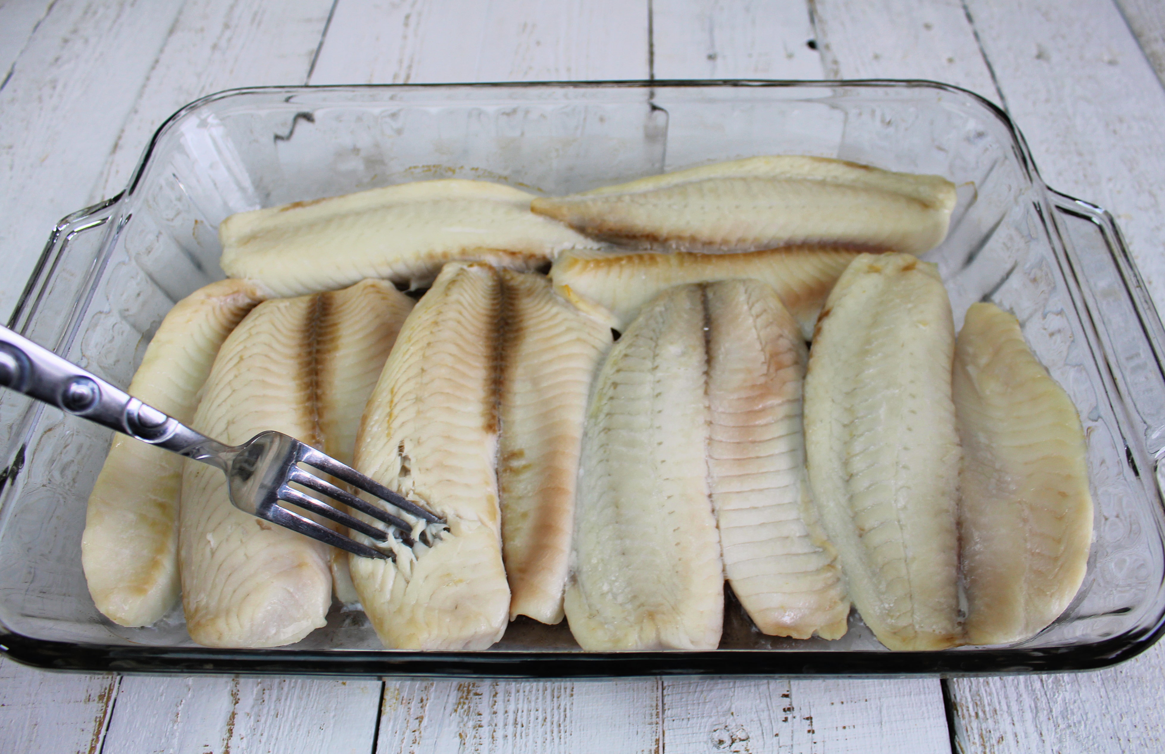 Broil fish until it flakes with a fork.