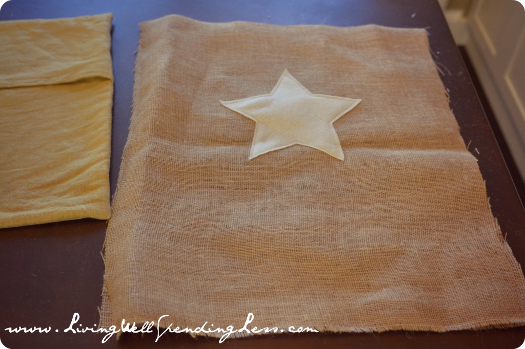 After sewing is complete, star should be completely secured to burlap without pins.