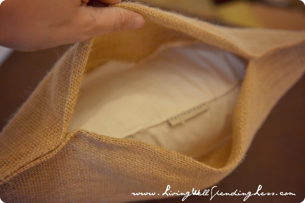 Once your pillow is in, pull the flap of longer fabric over the pillow and flatten.