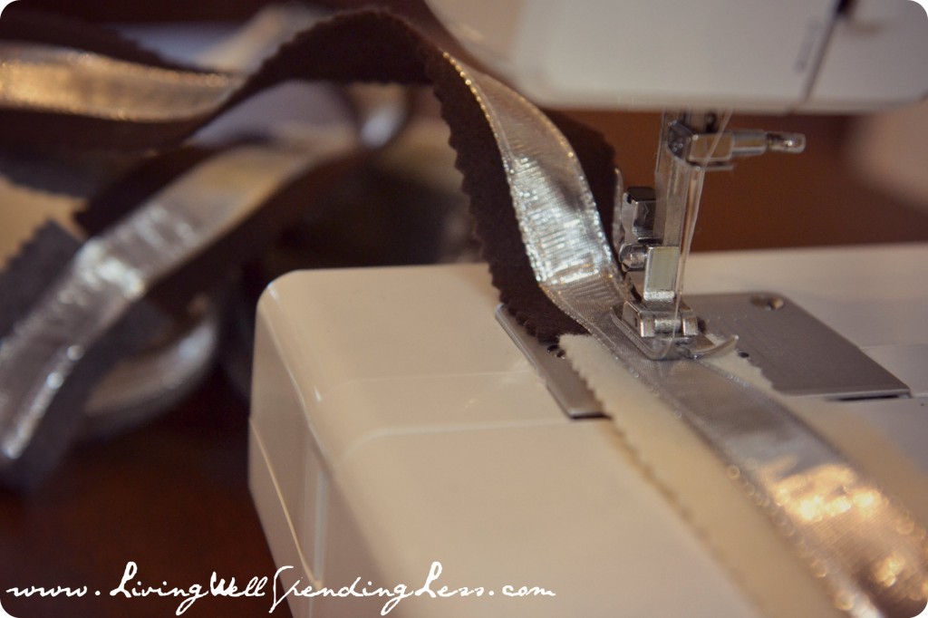 Sew the wired ribbon to the center of the felt strips.