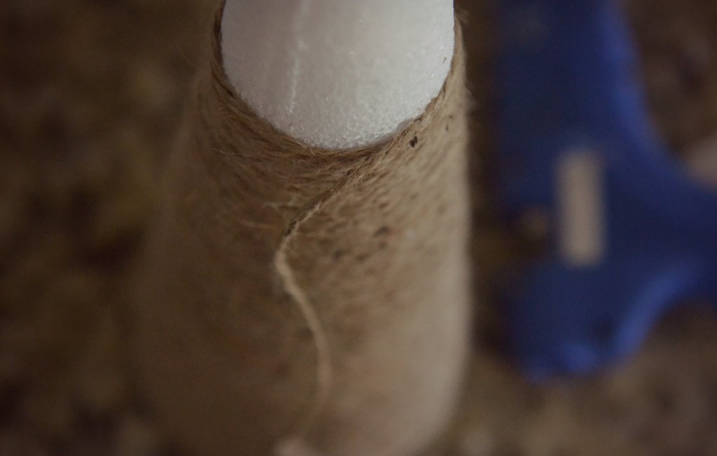Continue gluing the twine to the cone until completely covered. 