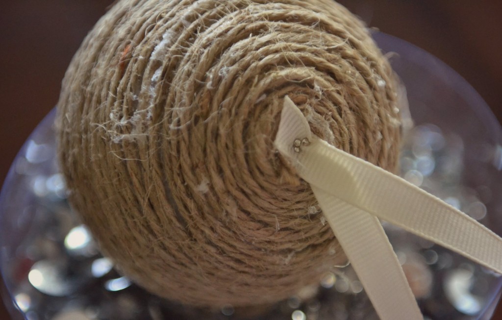 Cover styrofoam balls with twine to make festive ornaments. 