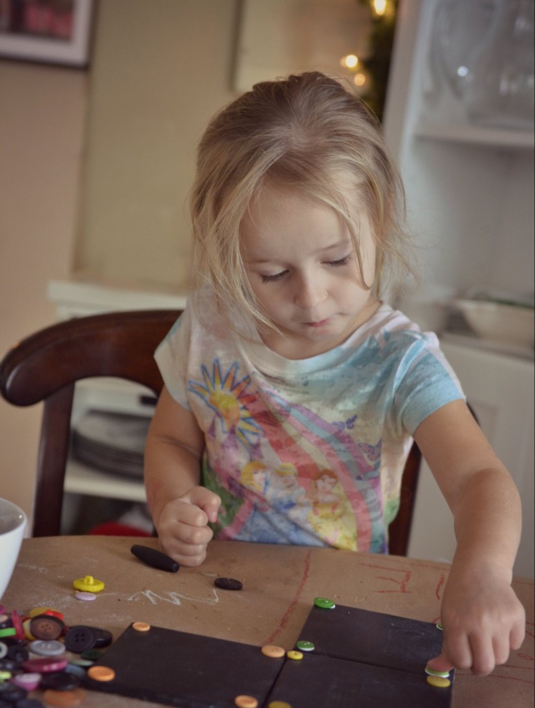 DIY Chalkboard Coaster Set | Your kids will love helping out on this DIY chalkboard coaster project. They can help pick and apply buttons for decoration!