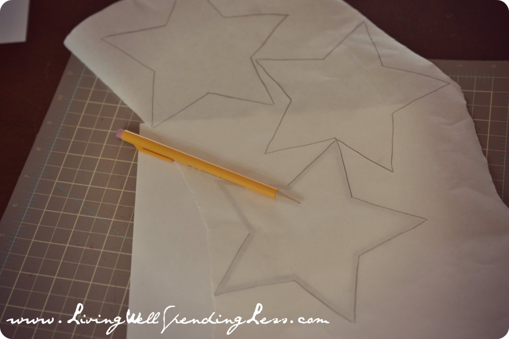 Trace a star shape onto the freezer paper using a pencil.