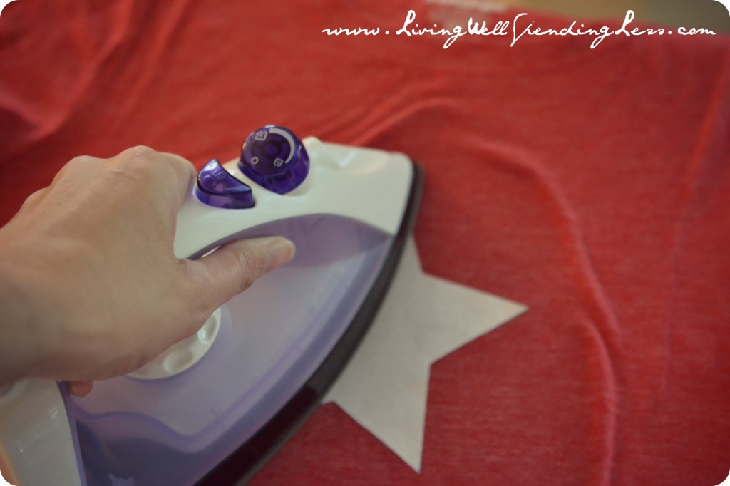 Iron star shape directly onto red t-shirt. 