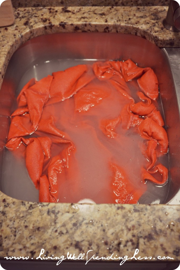 Dunk shirt into OxiClean in sink and let soak. 