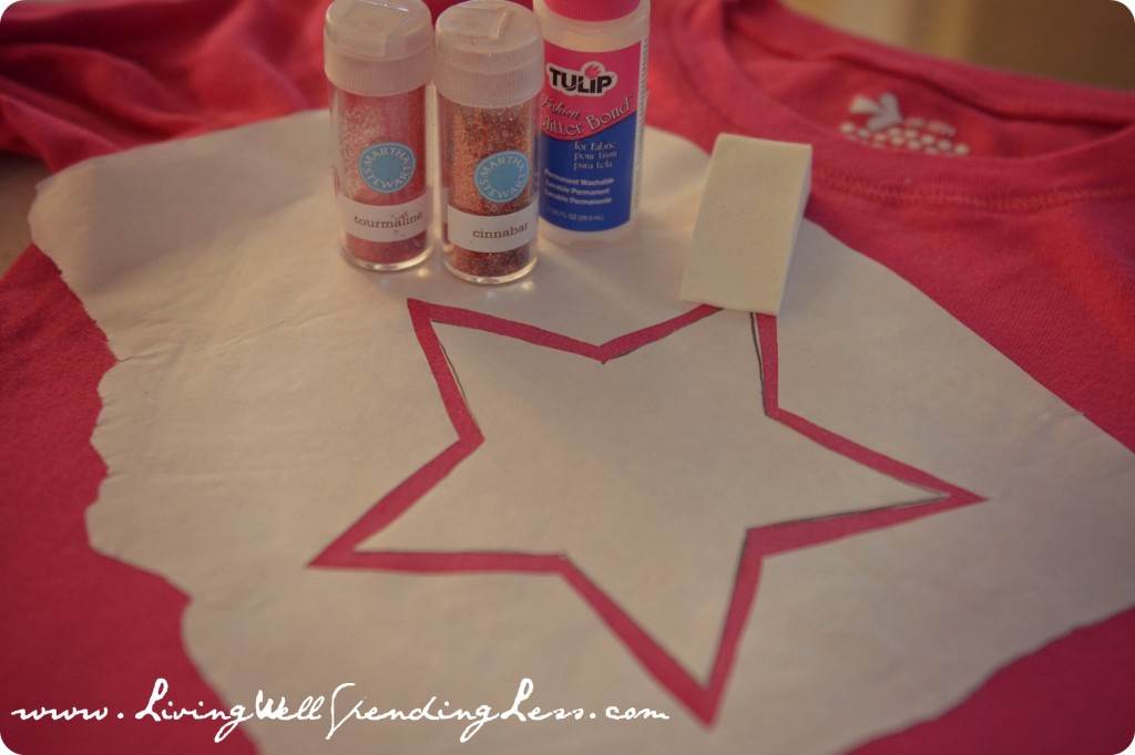 Use a star shaped freezer paper stencil, glitter, a makeup sponge and glue to make a vintage looking t-shirt. 