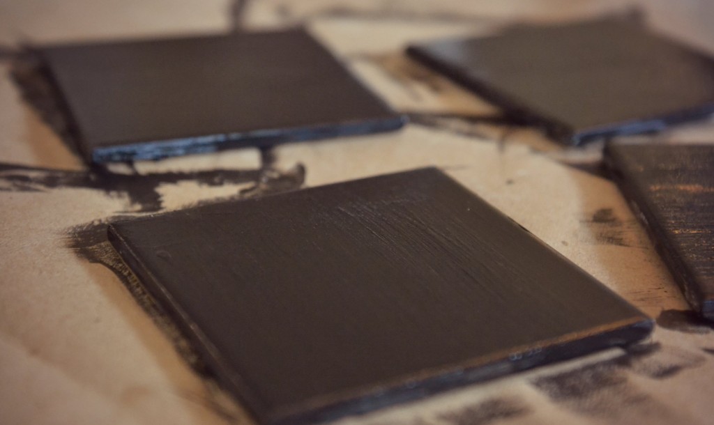 DIY Chalkboard Coaster Set | Three coats of chalkboard paint will cover the tile completely.