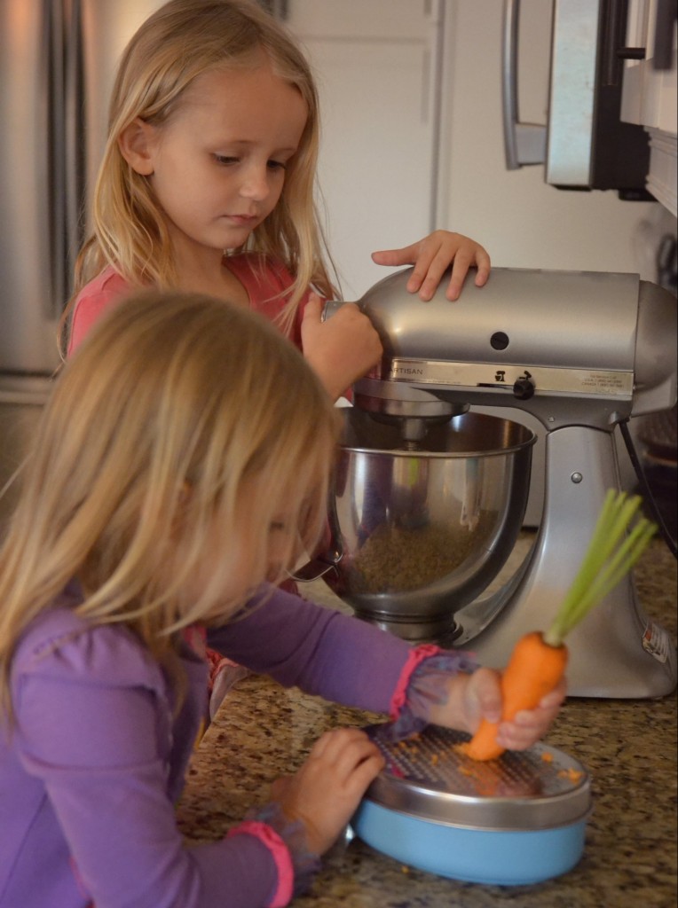 Grating carrots to add to homemade butter we made in a mixer. 