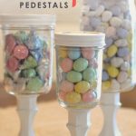 DiY Mason Jar Candy Pedestals--so cute & super easy (and CHEAP) to make using mason jars & dollar store candlesticks! Swap out candy to use for different holidays