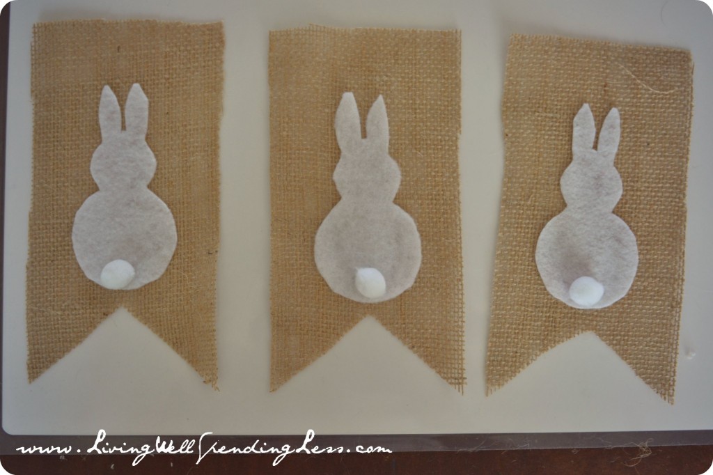 Attach white pom poms to the bunnies as tails. 