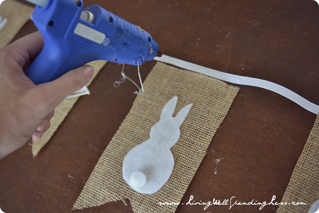 Arrange finished burlap pieces then attach to ribbon using hot glue. 