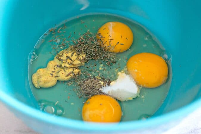 Mix eggs, mustard and spices