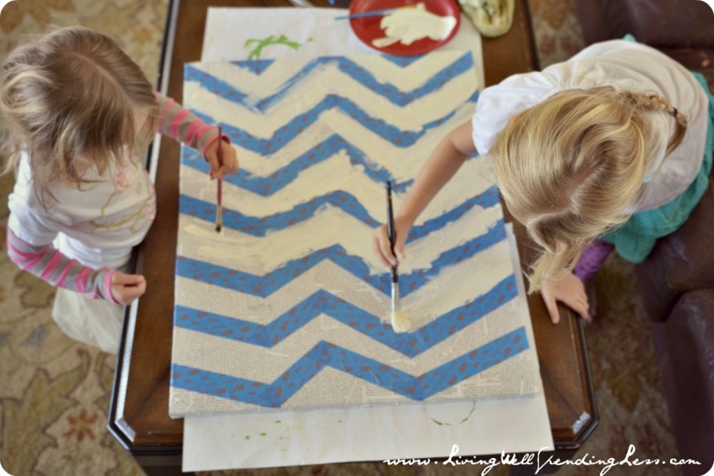 Paint over the canvas but don't let dry completely