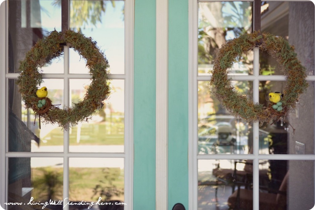 Showcase completed moss wreaths on front doors of your home. 