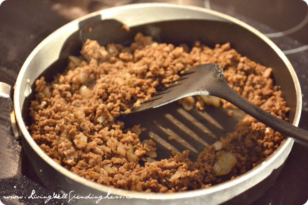 Saute butter, onions, and vegetarian crumbles in a hot pan. 