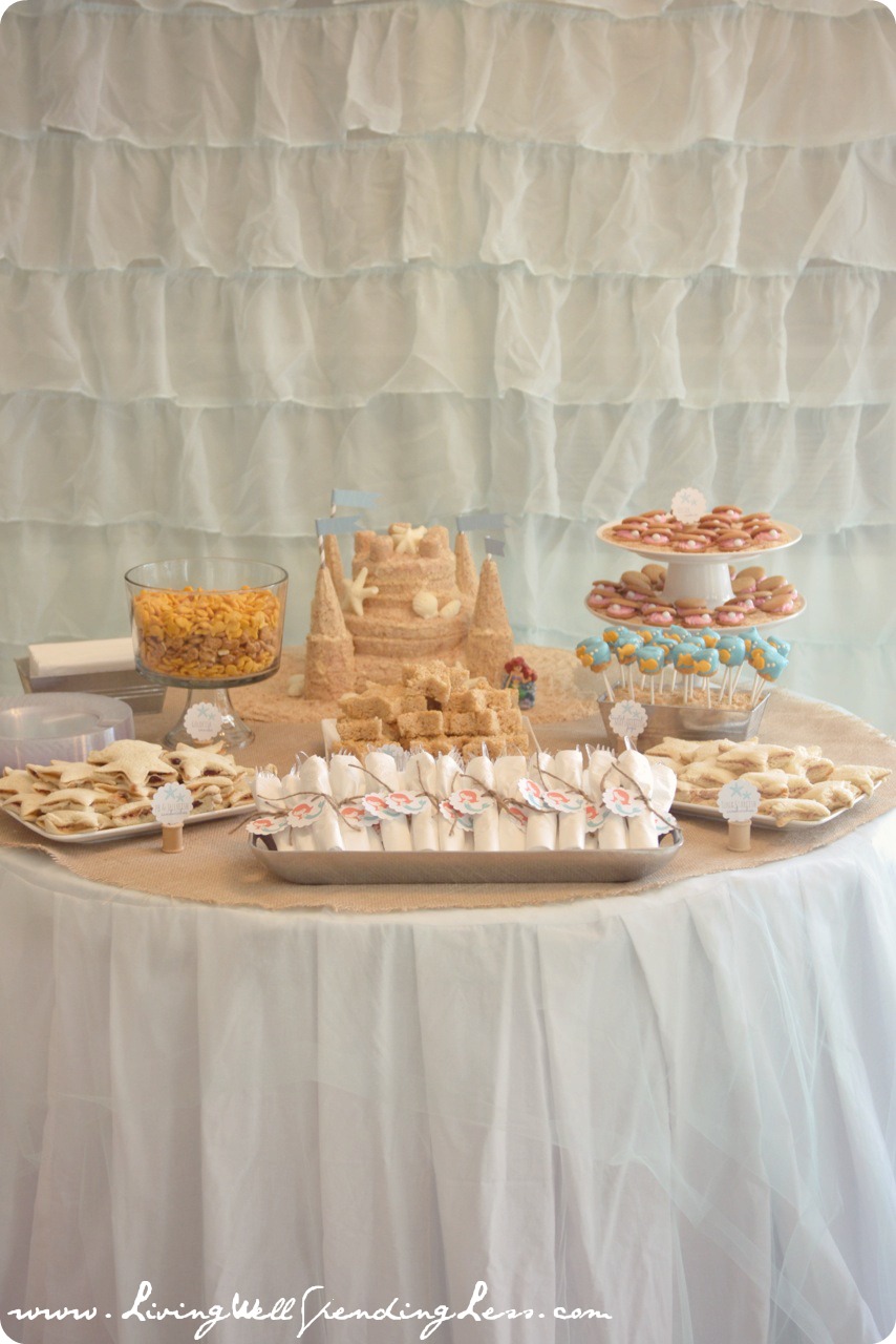 The sandcastle themed cake, starfish sandwiches, goldfish crackers and cakepops were a huge hit. 