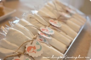 Napkins with adorable mermaid buttons are ready for the party!